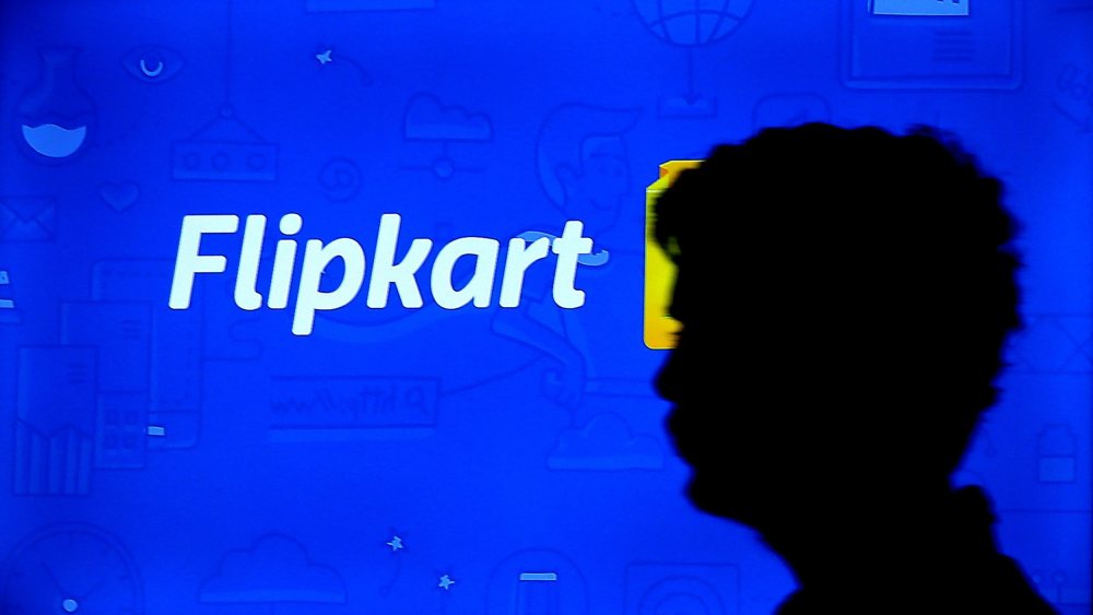 A Visitor is Silhouetted As He Walk Past the Logo of Flipkart at Surge 2016 Event For Startup Businesses at Manpho Convention Centre in Bangalore India 24 February 2016 More Than 400 Startups and 5 000 Attendees From 72 Countries Took Part in This Startups Event to Showcase Their Web Based and Mobile App Based Innovative Products Web Summit and Conference As Part of the Global Startup Ecosystem India BangaloreIndia Business Surge 2016 Bangalore - Feb 2016