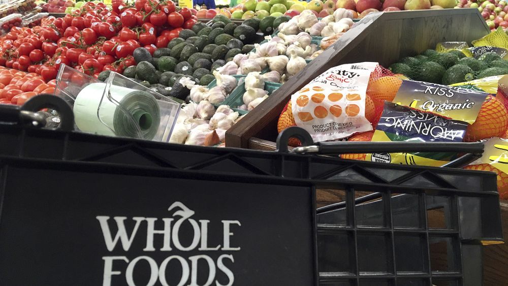 This, photo, shows produce displayed at Whole Foods Market in Andover, Mass. Amazon is buying Whole Foods in a deal valued at about $13.7 billion. The two companies have not yet detailed how their proposed union might change the experience for customers. But the deal has the potential to boost the outsized ambitions of Amazon CEO Jeff Bezos and Whole Foods chief John Mackey, each of whom has already radically altered the way Americans shopAmazon-Whole Foods-Ambitions, Andover, USA - 05 Jun 2017
