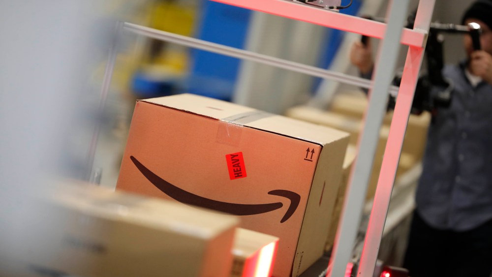 Amazon fulfillment center in Aurora, Colo. Boxes move down a conveyor belt during a tour of the Amazon fulfillment center, in Aurora, Colo. More than 1,000 full-time associates work in the Aurora facility, which opened in September 2017, and is one of more than 100 such fulfillment centers scattered across North AmericaAmazon Colorado - 03 May 2018