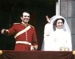Princess Anne, daughter of Queen Elizabeth II, with her husband Captain Mark Phillips of the First Queen's Dragoon Guards, waves from the balcony of Buckingham Palace, London, following their wedding in Westminster Abbey.