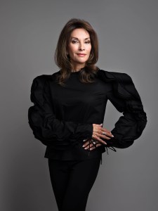 Antonio Berardi’s blouse and Cushnie et Ochs’ trousers. Jessica Biales earrings; rings Lucci’s own.