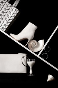 Issey MiyakeÕs bag; Manolo BlahnikÕs boot; Christopher KaneÕs glasses; Jil SanderÕs bag