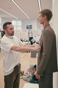 Kim Jones working on his debut collection for Dior Homme.