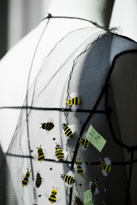 Dior's signature bee, redesigned by Kaws and embroidered at Maison Lemarié.