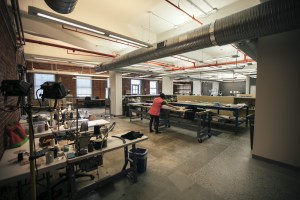 Eileen Fisher has collected more than one million gently worn garments. Here, an employee restoring a garment in its New York factory.