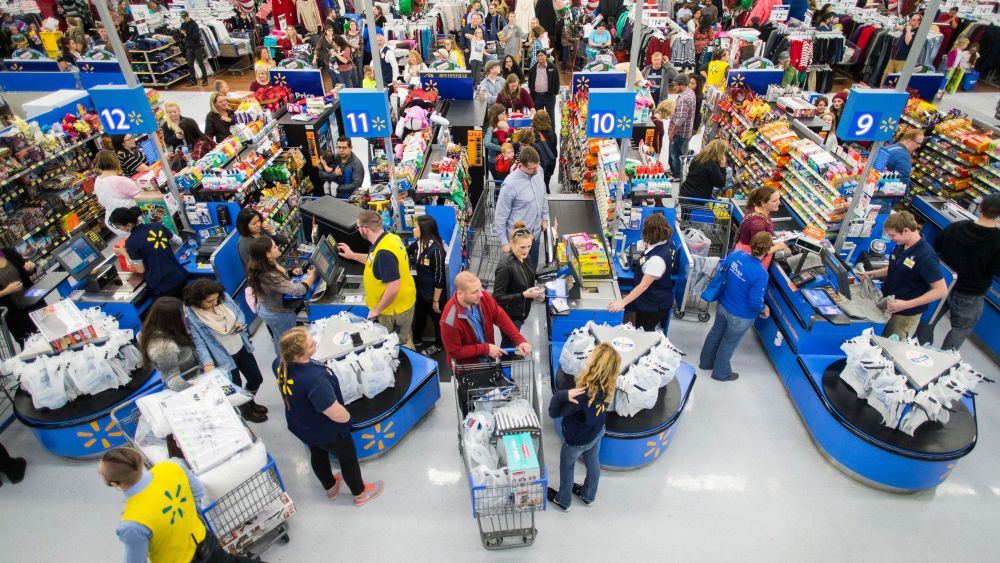 Customers leave happy from a Walmart store in Bentonville, AR, with their Black Friday items on . This year, Walmart stocked its digital and physical aisles with more than 1.5 million televisions, nearly two million tablets and computers and three million video gamesWalmart Thanksgiving shopping events, Bentonville, USA - 24 Nov 2016