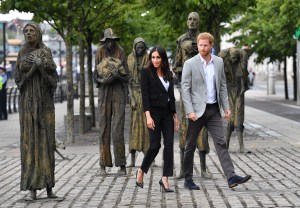 Meghan Duchess of Sussex and Prince Harry visit the Famine Memorial
