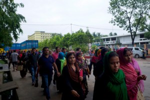 Garment workers in Chittagong, southern Bangladesh, leave their factories at the end of the day.