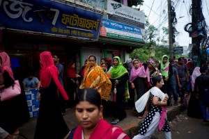 Masses of women leave their factories at the end of the day in Chittagong, southern Bangladesh. This region has more than 500,000 people employed in its garment sector.