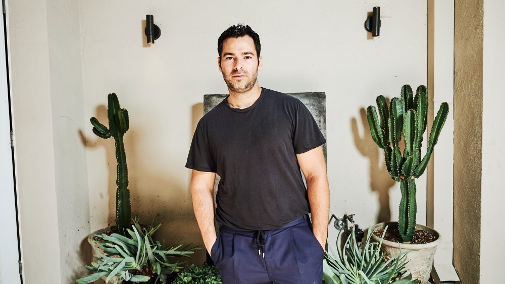 Jonathan Simkhai poses for a portrait in his first retail space in Los Angeles on July 20, 2018.
