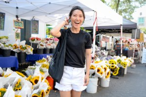 girl in shorts in flower market