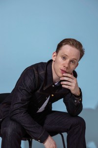 Joe Cole in Dunhill's cotton denim jacket and pants and Calvin Klein Underwear’s cotton T-shirt. Haider Ackermann boots.