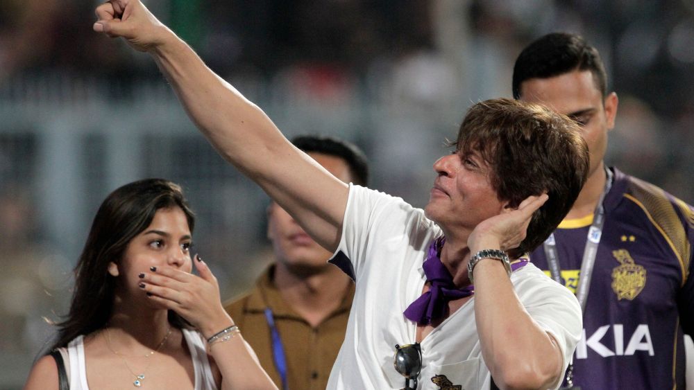 Bollywood actor and co-owner of Kolkata Knight Riders Shah Rukh Khan gestures towards the crowd as he walks around the venue with his daughter Suhana Khan after his team won the match against Royal Challengers Bangalore in the VIVO IPL cricket T20 match against Royal Challengers Bangalore in Kolkata, IndiaCricket VIVO IPL 2018, Kolkata, India - 08 Apr 2018