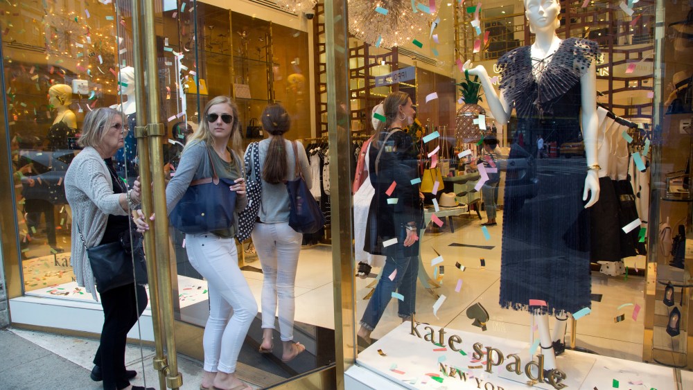 Shoppers enter the Kate Spade Madison Avenue store, in New York. Law enforcement officials say fashion designer Kate Spade has been found dead in her apartment in an apparent suicideKate Spade Death, New York, USA - 05 Jun 2018