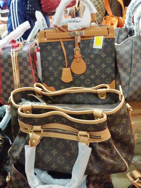 A collection of fake designer handbags