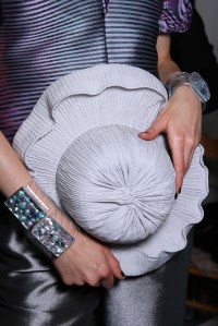 Model backstage, hat detail