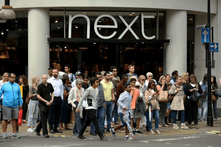 Next Beats U.K. Heat as It Raises Full-Year Profit Outlook