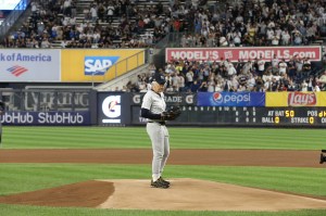 Ralph Lauren throws the opening pitch of the New York Yankees vs Boston Red Sox game in celebration of Ralph Lauren 50th anniversary.