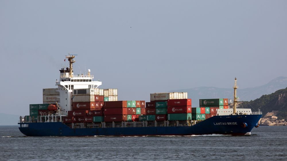 A container ships sails in the East Lamma Channel on his way to Hong Kong in Hong Kong, 11 July 2018. According to reports, Hong Kong's finance minister Paul Chan said the short-term impact on the city of China's escalating trade war with the United States would be limited to a dip in growth of just 0.1 or 0.2 of a percentage point. According to reports, US President Donald Trump announced on 10 July that US is preparing to impose 10 percent tariffs worth 200 billion US dollars on imported goods from China.A container ships sails the East lamma Channel, Hong Kong, China - 11 Jul 2018