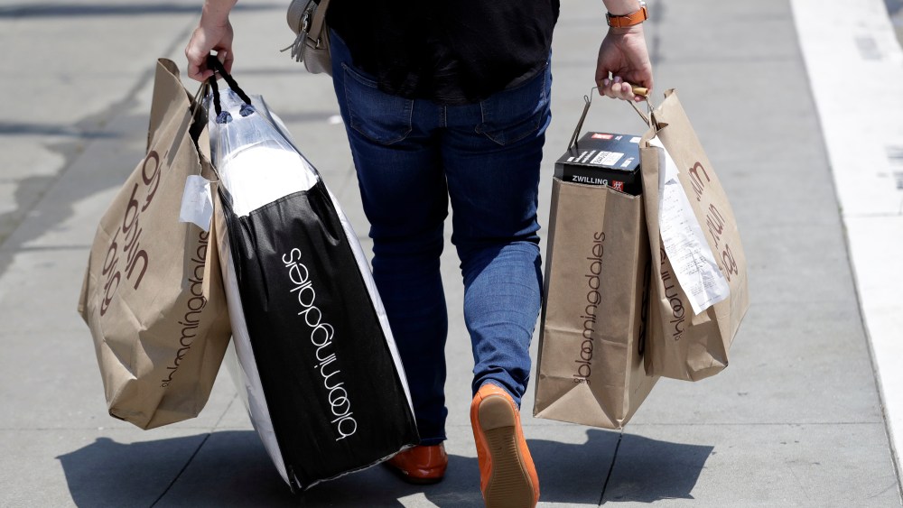A shopper carries bags in San Francisco. On Monday, July 16, the Commerce Department releases U.S. retail sales data for JuneRetail Sales, San Francisco, USA - 03 Jul 2018
