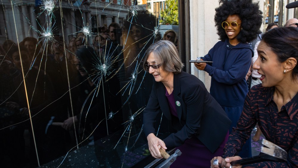 TV broadcaster Anita Rai and Dr Helen Pankhurst smash Harvey Nichols window at unveiling