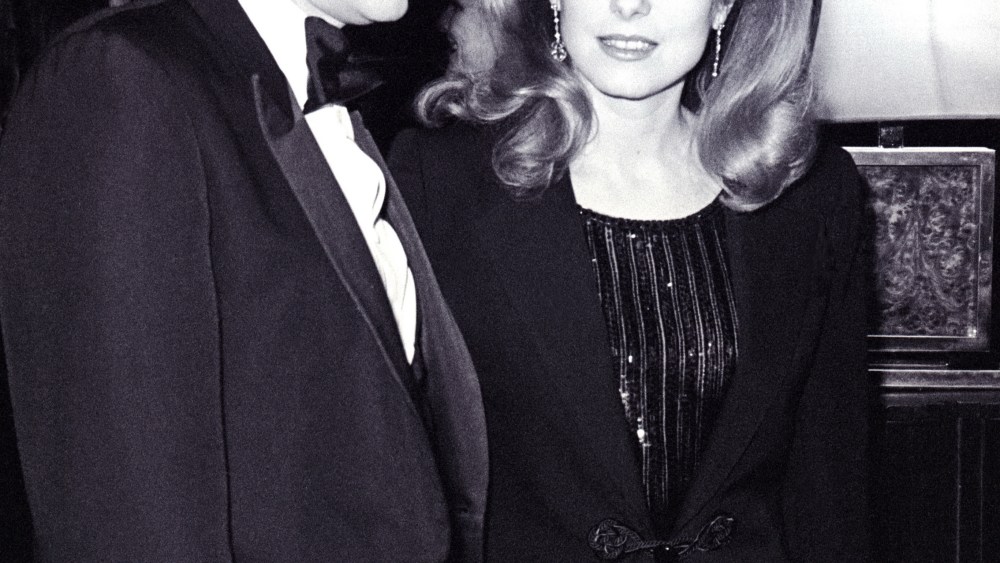 Yves Saint Laurent and Catherine Deneuve at the couture house's 20th birthday on Jan. 29 1982