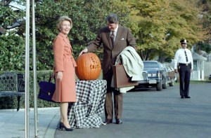 President Ronald Reagan admires a pumpkin carved with the slogan "Stay the Course." President Reagan used the slogan during the 1982 midterm elections.