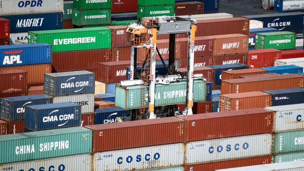 French dockers work on the port loading and unloading containers during the inauguration of the CMA CGM Antoine de Saint Exupery container ship in Le Havre, France, 06 September 2018. The Antoine de Saint Exupery containers ship is one of the biggest of its kind to French flag-fly with a length of 400 meters for 59 meters width and is able to receive more than 20000 containers.Containers ship Antoine de Saint Exupery's inauguration in Le Havre, France - 06 Sep 2018