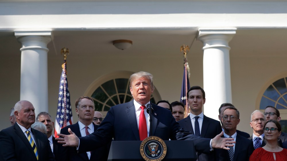 President Donald Trump, center, gestures as he announces a revamped North American free trade deal, in the Rose Garden of the White House in Washington, . The new deal, reached just before a midnight deadline imposed by the U.S., will be called the United States-Mexico-Canada Agreement, or USMCA. It replaces the 24-year-old North American Free Trade Agreement, which President Donald Trump had called a job-killing disasterNorth America Trade Trump, Washington, USA - 01 Oct 2018