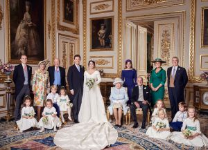 The official wedding photograph released by the Royal Communications of Princess Eugenie and Mr Brooksbank, shows - Princess Eugenie and Jack Brooksbank in the White Drawing Room, Windsor Castle with (left to right) Back row: Mr Thomas Brooksbank ; Mrs Nicola Brooksbank; Mr George Brooksbank; Her Royal Highness Princess Beatrice of York; Sarah, Duchess of York; His Royal Highness The Prince Andrew. Middle row: His Royal Highness Prince George ; Her Royal Highness Princess Charlotte ; Queen Elizabeth II ; His Royal Highness Prince Philip ; Miss Maud Windsor ; Master Louis de Givenchy ; Front row: Miss Theodora Williams ; Miss Mia Grace Tindall ; Miss Isla Phillips ; Miss Savannah Phillips.