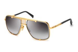 DitaÕs limited edition Mach 5 in yellow gold titanium frame with black acetate temple tips.