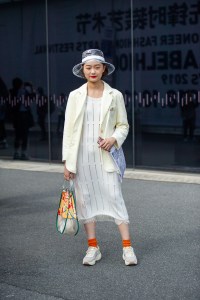 Street Style at Shanghai Fashion Week Spring 2019.
