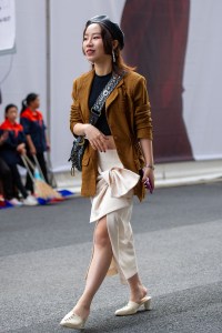 Street Style at Shanghai Fashion Week Spring 2019.