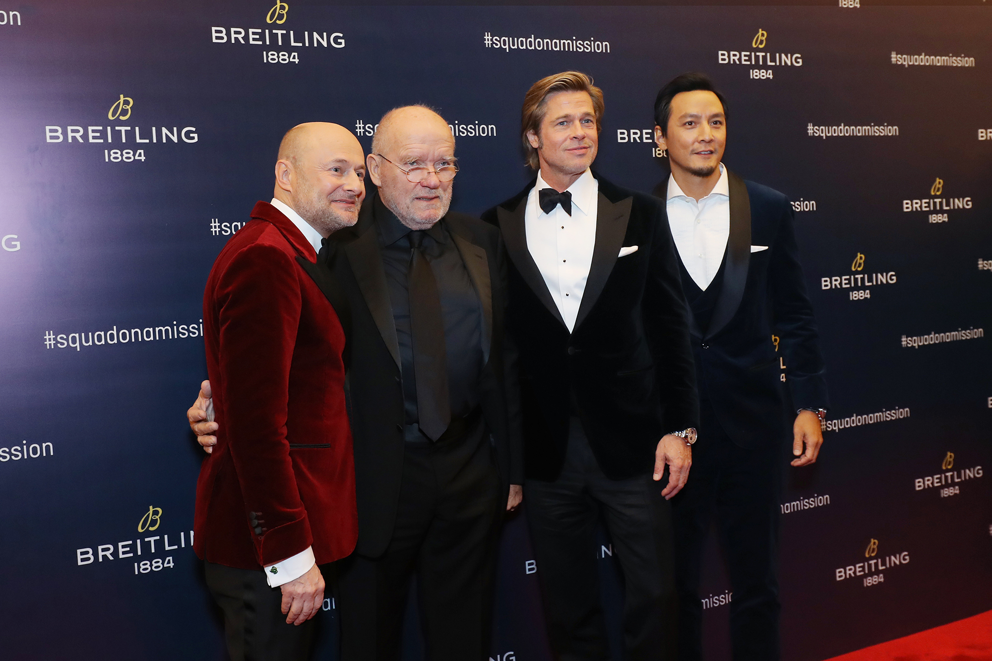 From left to right: Georges Kern, Peter Lindbergh, Brad Pitt, and Daniel Wu.