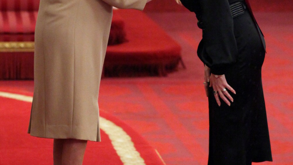 Charlotte Tilbury is made an MBE by Queen Elizabeth II at Buckingham Palace.