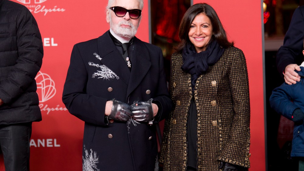 Karl Lagerfeld and Anne Hidalgo at the inauguration of the holidays lights on the Avenue des Champs-Elysées.