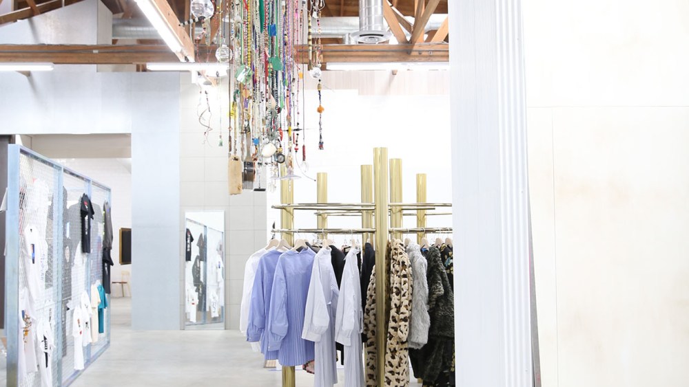 A view of the space and a chandelier by Lyn Dillin