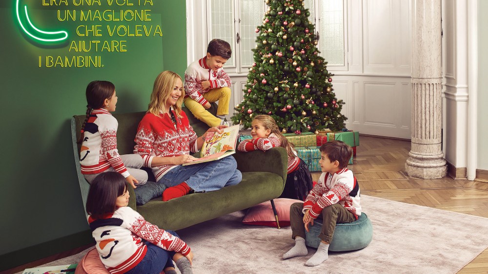 Frida Giannini sporting the Christmas jumper she designed for OVS to support Save The Children.