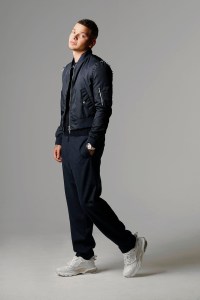 Valentino’s jacket and sweater, worn with Mr P.’s pants, available exclusively at mrporter.com. Valentino sneakers.