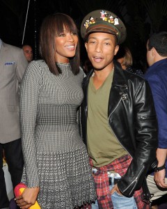 Naomi Campbell and Pharrell Williams at the Kingdom of Morocco and Maybach Private Dinner for Moca in Miami,2011.