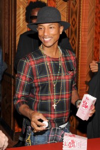 Pharrell Williams at a Dinner and Carnival hosted Emmanuel Perrotin,  celebrating the Opening of Galerie Perrotin in New York, 2013.