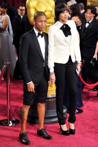Pharrell Williams and Helen Lasichanh at the 86th Annual Academy Awards, 2014.