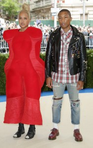 Pharrell Williams and Helen Lasichanh at the Costume Institute Benefit celebrating the opening of Rei Kawakubo/Comme des Garcons: Art of the In-Between, Arrivals at the Metropolitan Museum of Art in New York, 2017