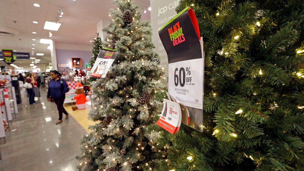A shopper walks past a display of artificial Christmas trees at a JCPenney store, in Seattle. Black Friday has morphed from a single day when people got up early to score doorbusters into a whole season of deals, so shoppers may feel less need to be outHoliday Shopping Black Friday, Seattle, USA - 24 Nov 2017