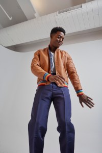 Loewe's nappa, nylon and lambskin jacket, T by Alexander Wang's cotton tank top and Dunhill's silk pants.