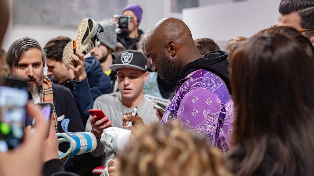 Virgil Abloh signing shoes at Spazio Maiocchi in Milan
