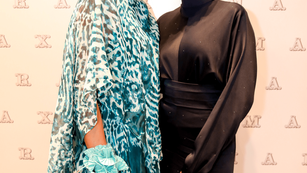 Nicola Maramotti and Halima Aden at the new Max Mara flagship in Dubai