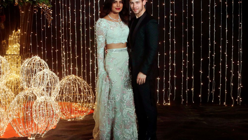 Priyanka Chopra in Jani Sandeep Khosla and Nick Jonas in Abu Jani and Sandeep Khosla.