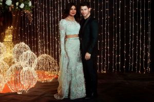 Priyanka Chopra in Jani Sandeep Khosla and Nick Jonas in Abu Jani and Sandeep Khosla.