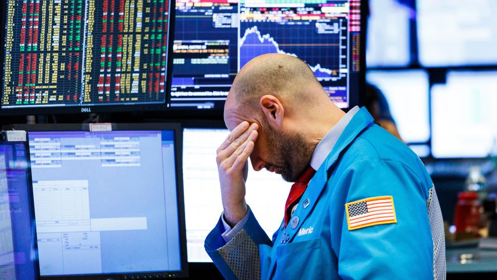 A trader works on the floor of the New York Stock Exchange at the closing bell in New York, New York, USA, on 04 December 2018. The Dow Jones industrial average lost almost 800 points today, or 3.1%, as investors continued to react to the details of the reported trade deal between the United States and China.New York Stock Exchange, USA - 04 Dec 2018